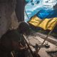 «Під канонаду розривів, стримуючи тремтіння рук» - українські бійці прикрасили Авдіївку жовто-блакитними прапорами
