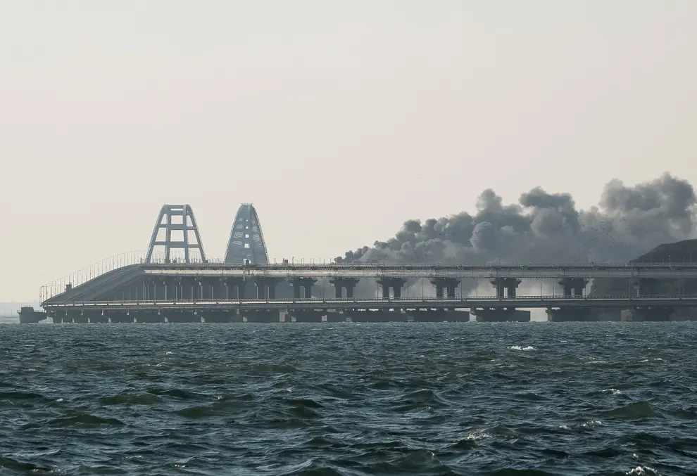 smoke rises from fire on the kerch bridge in the kerch strait crimea 1